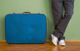 traveler and suitcase