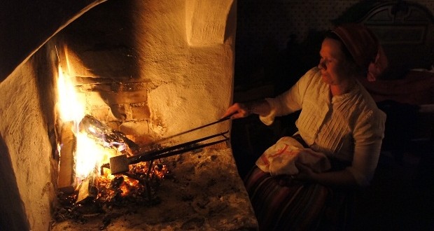 Making bread on the fire at a Swedish Xmas Market Making bread on the fire at a Swedish Xmas Market